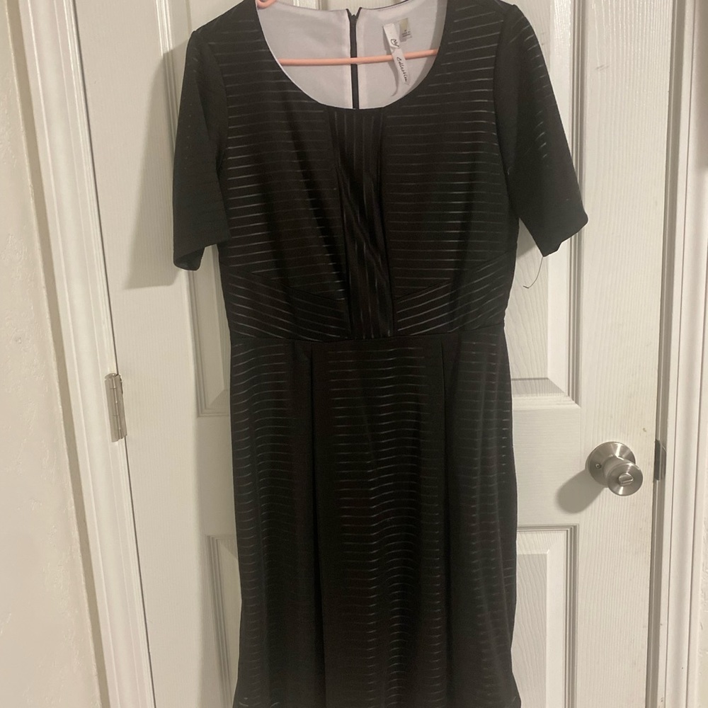Black dress hits knee are. Stretch size medium